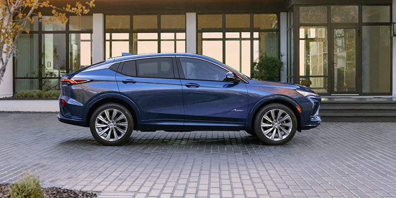 A blue 2024 Buick Envista parked.